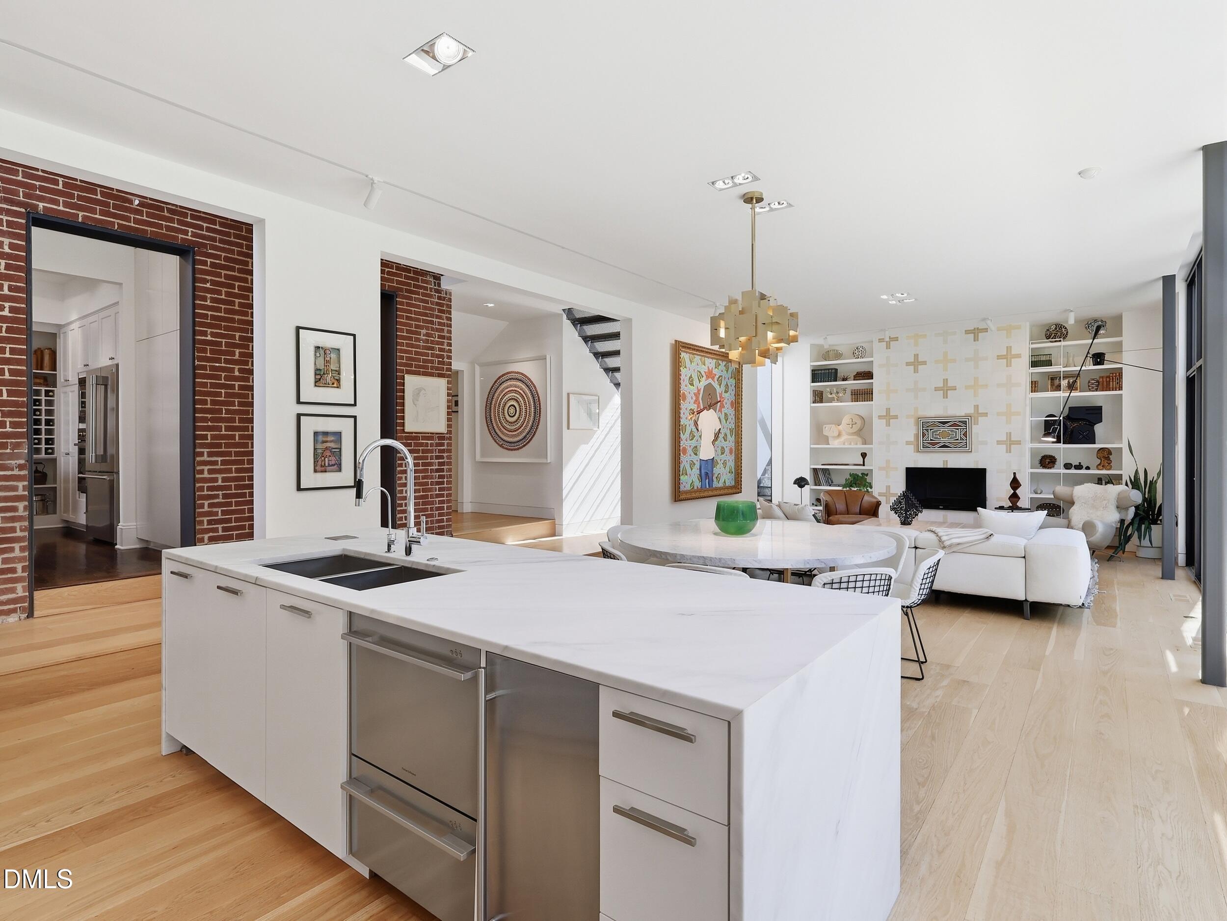 117 Hillcrest Road Raleigh, NC 27605 - Photo 12 of 80 a living room with furniture and a chandelier