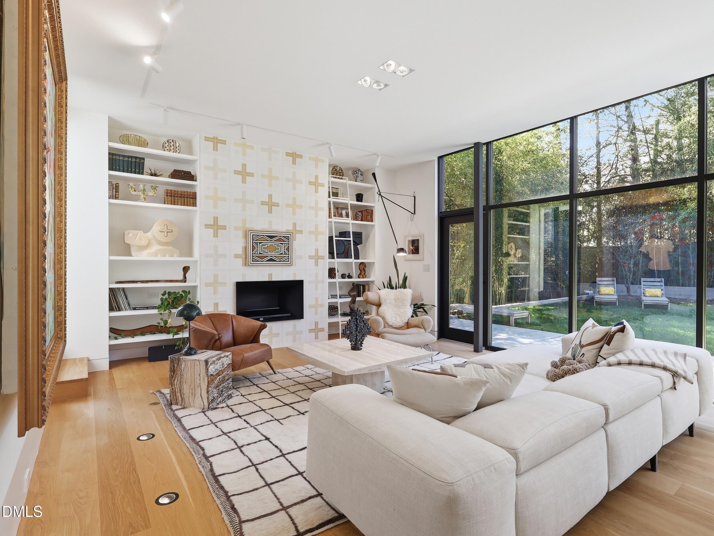 117 Hillcrest Road Raleigh, NC 27605 - Photo 3 of 80 a living room with furniture large window and fireplace