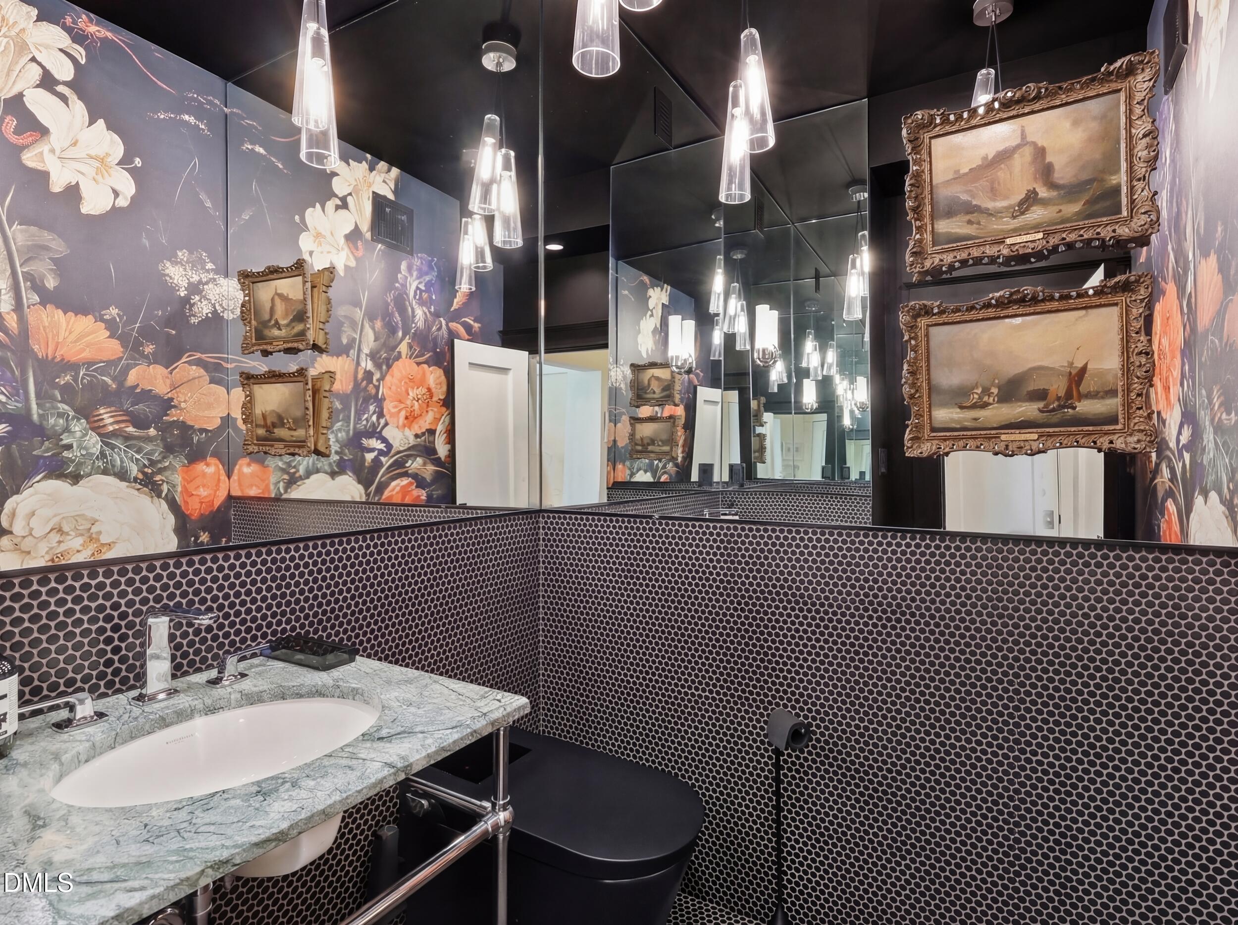 117 Hillcrest Road Raleigh, NC 27605 - Photo 33 of 80 a bathroom with a sink a toilet and mirror