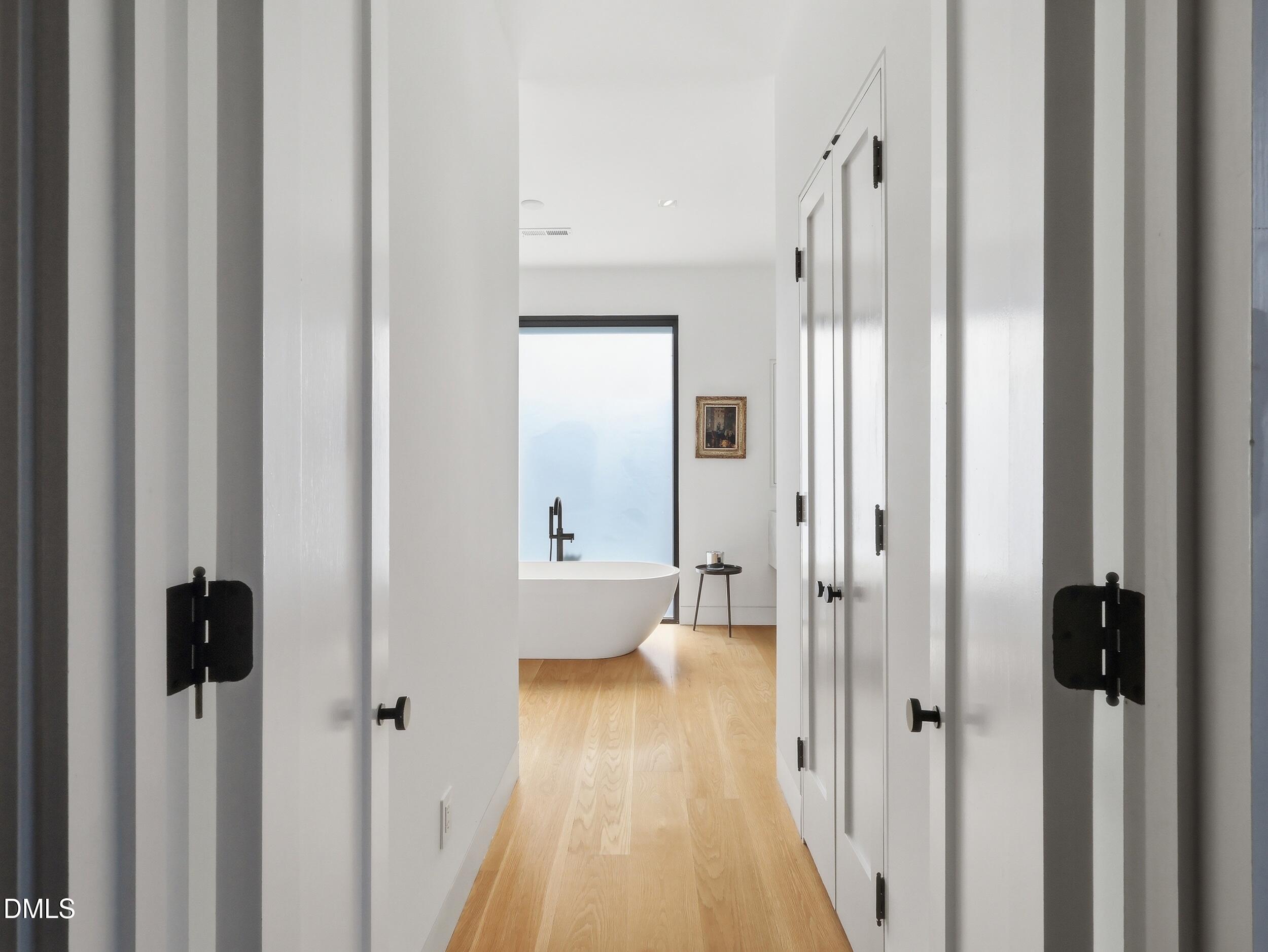 117 Hillcrest Road Raleigh, NC 27605 - Photo 39 of 80 a view of a bathroom from a hallway