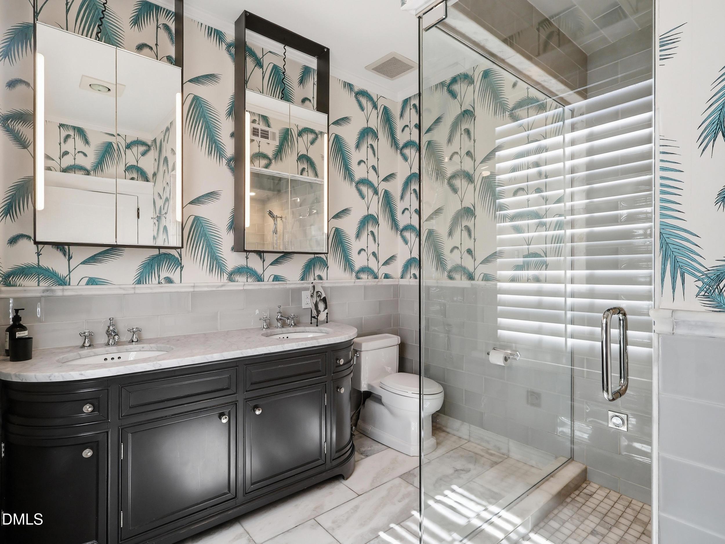 117 Hillcrest Road Raleigh, NC 27605 - Photo 48 of 80 a bathroom with a double vanity sink mirror and