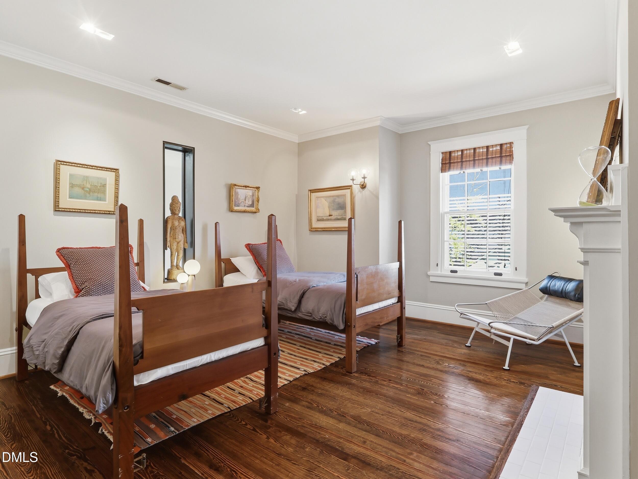 117 Hillcrest Road Raleigh, NC 27605 - Photo 49 of 80 a living room with furniture and a window