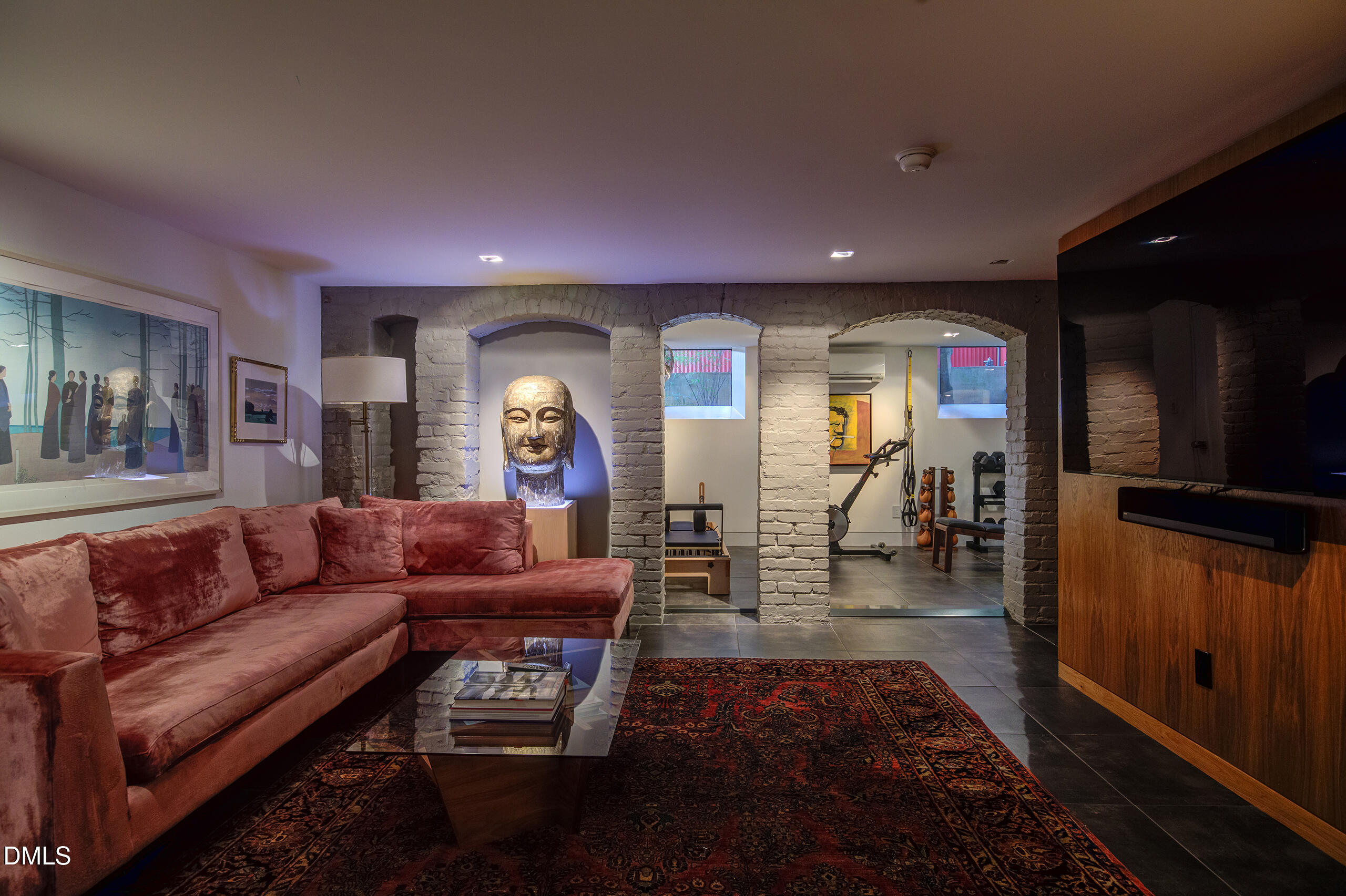117 Hillcrest Road Raleigh, NC 27605 - Photo 56 of 80 a living room with furniture and a wooden floor