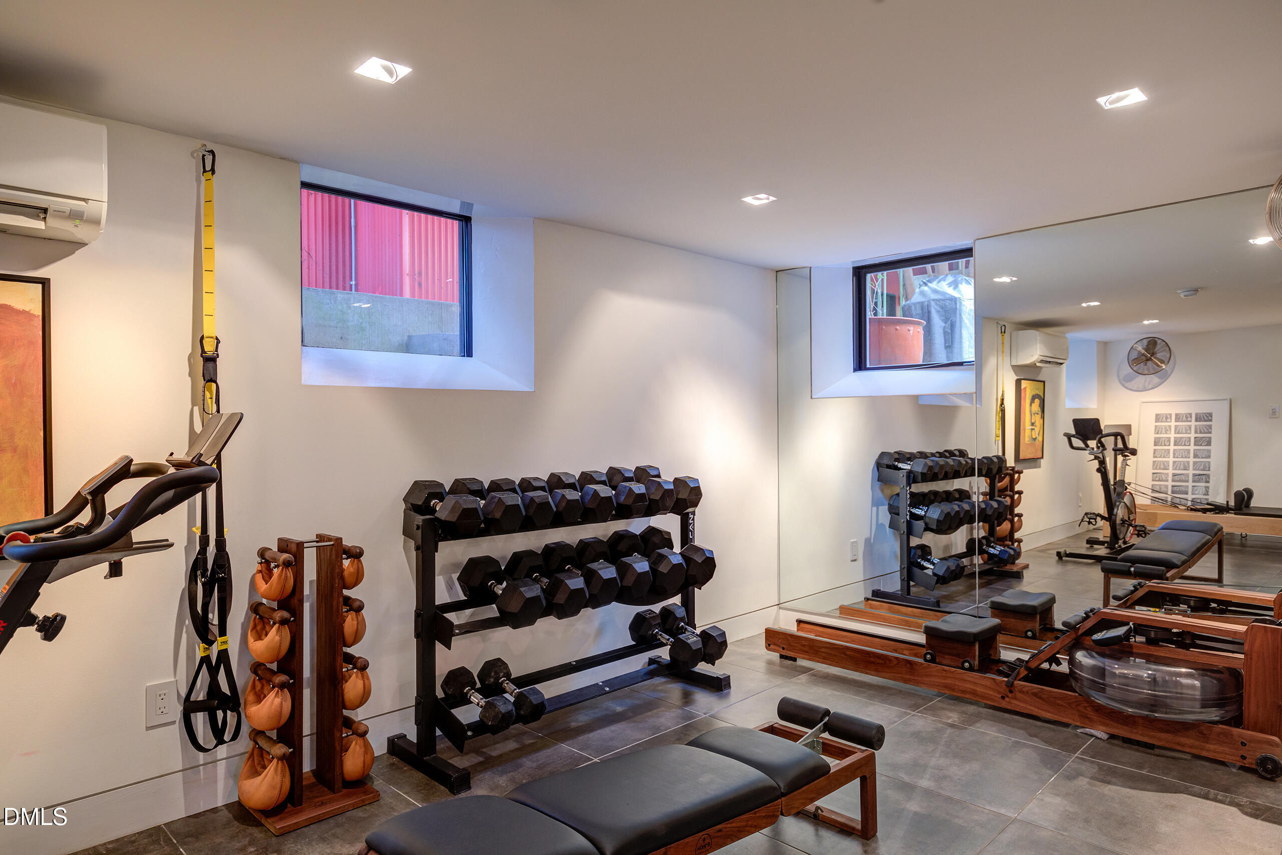 117 Hillcrest Road Raleigh, NC 27605 - Photo 62 of 80 a living room with lots of furniture and a wooden floor