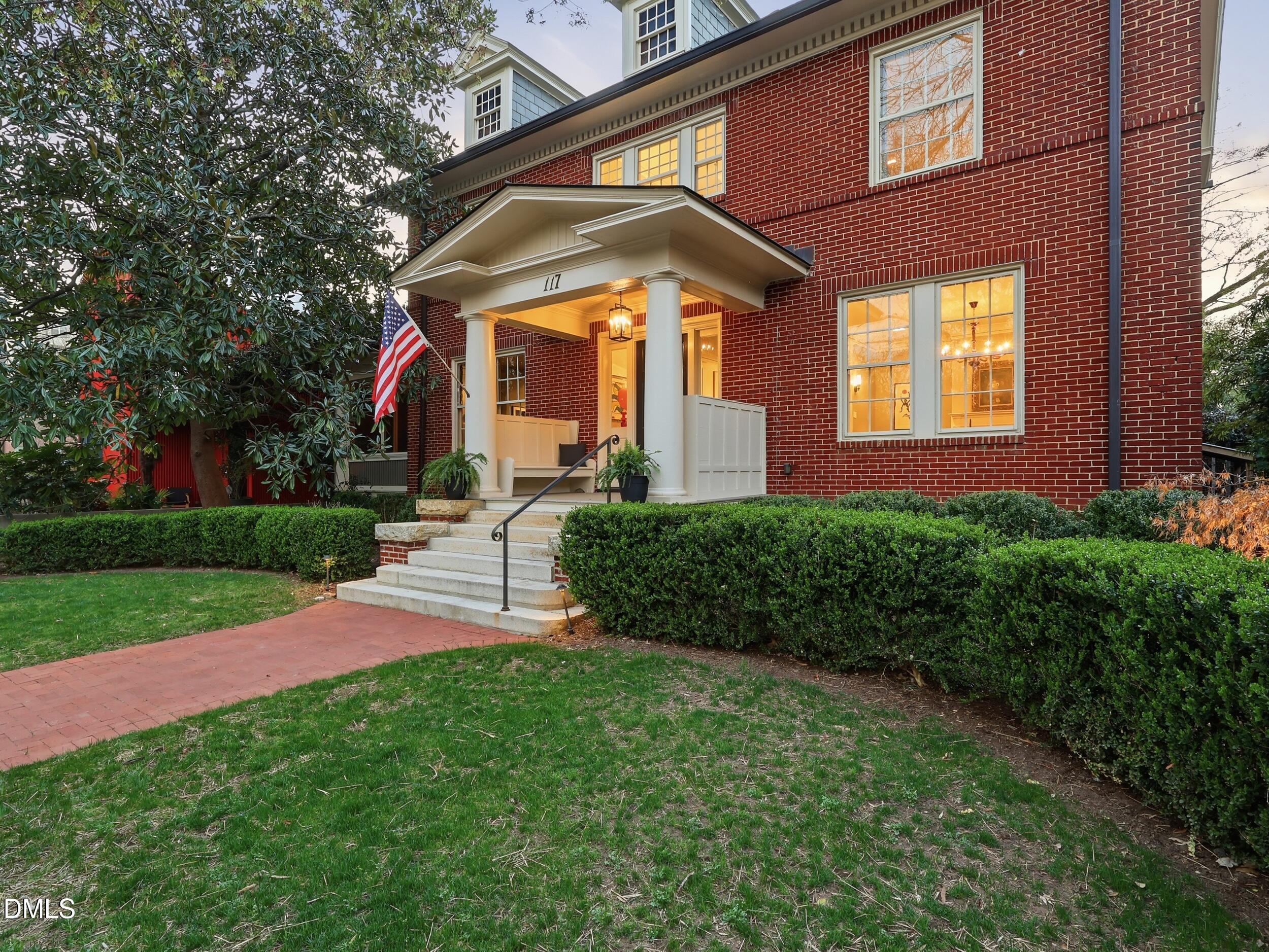 117 Hillcrest Road Raleigh, NC 27605 - Photo 77 of 80 a front view of a house with a yard
