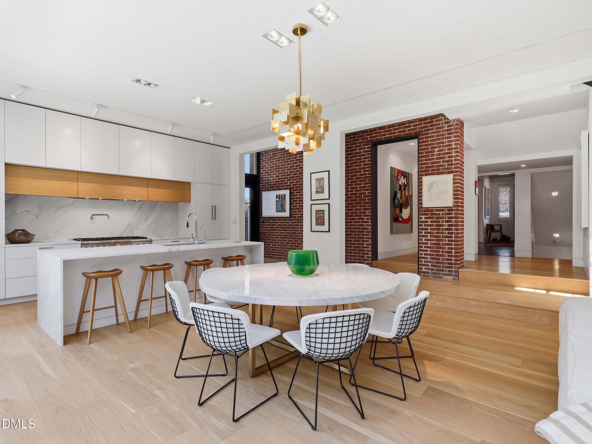 117 Hillcrest Road Raleigh, NC 27605 - Photo 8 of 80 a view of a dining room with furniture and wooden floor