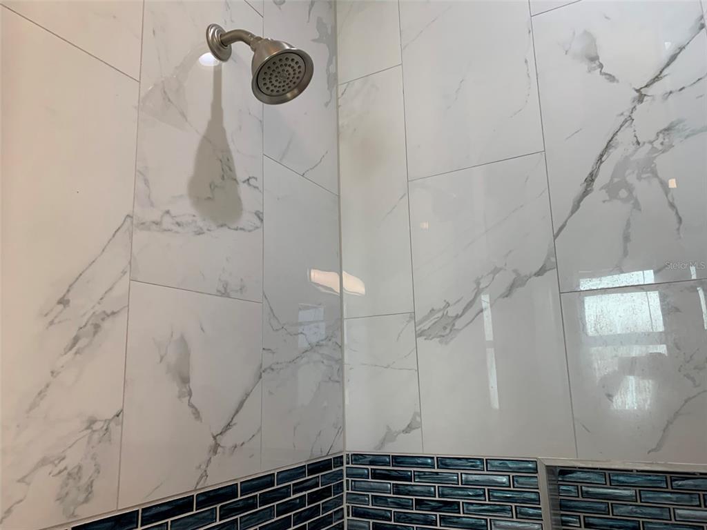 7410 Ellis Lane Port Charlotte, FL 33981 - Photo 14 of 23 a bathroom with a shower