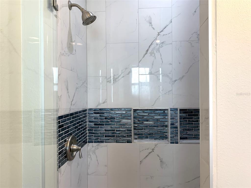 7410 Ellis Lane Port Charlotte, FL 33981 - Photo 15 of 23 a bathroom with a shower