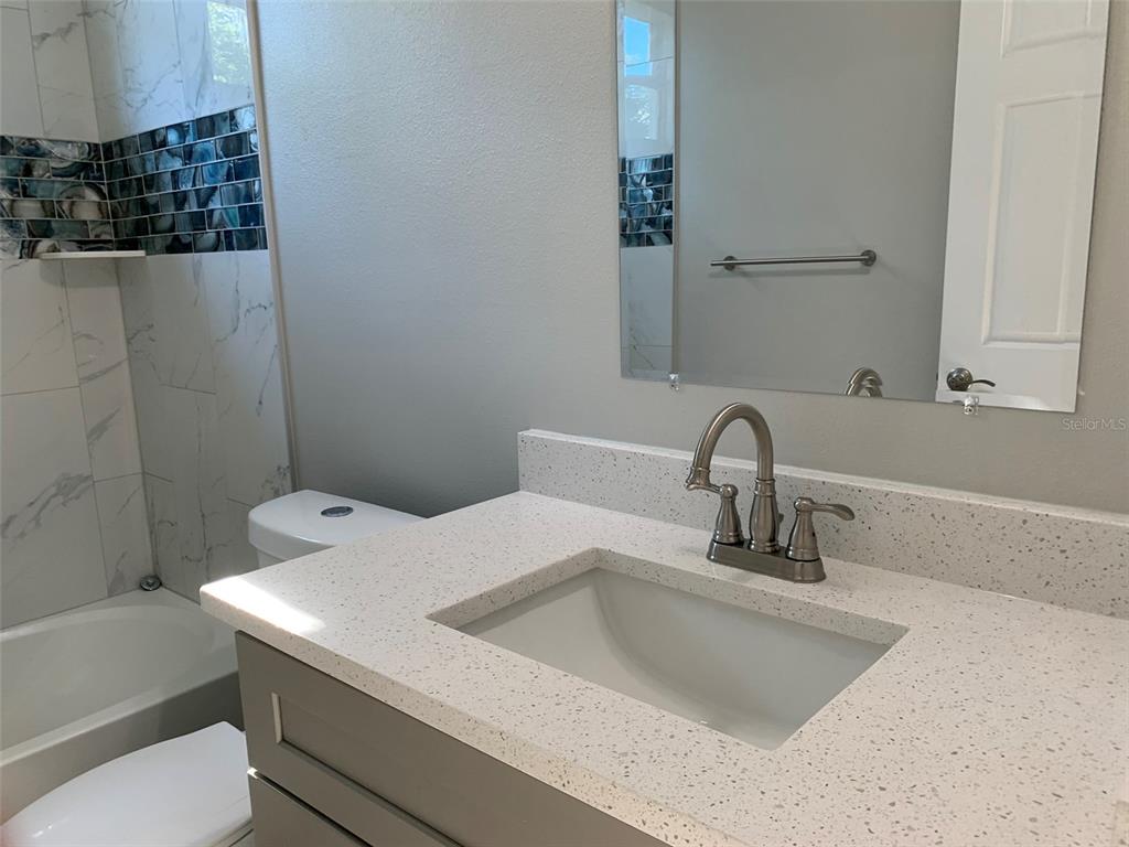 7410 Ellis Lane Port Charlotte, FL 33981 - Photo 18 of 23 a bathroom with a sink and a toilet