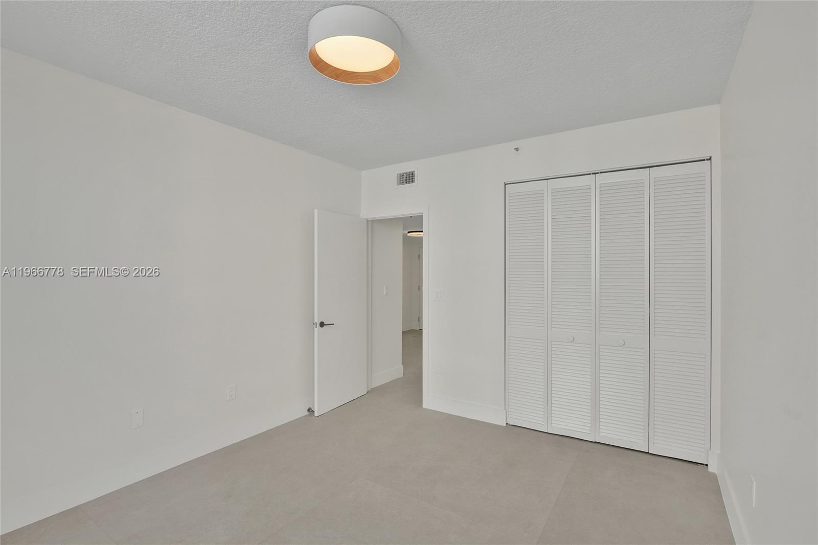 1834 Brickell Avenue, Unit 31 Miami, FL 33129 - Photo 18 of 35 a view of an empty room