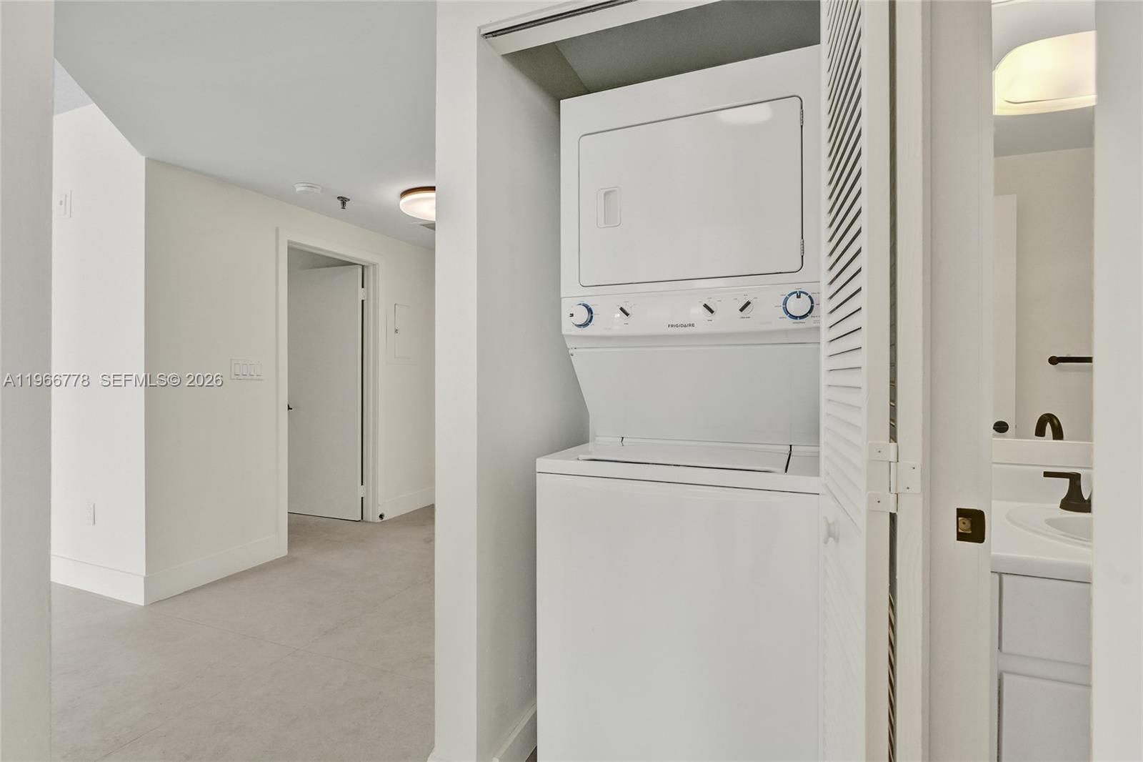 1834 Brickell Avenue, Unit 31 Miami, FL 33129 - Photo 22 of 35 a view of bathroom with washer and dryer