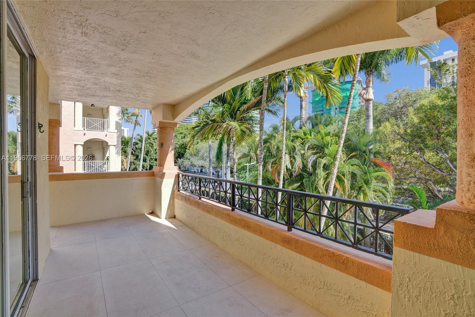 1834 Brickell Avenue, Unit 31 Miami, FL 33129 - Photo 29 of 35 a view of a room with lots of windows