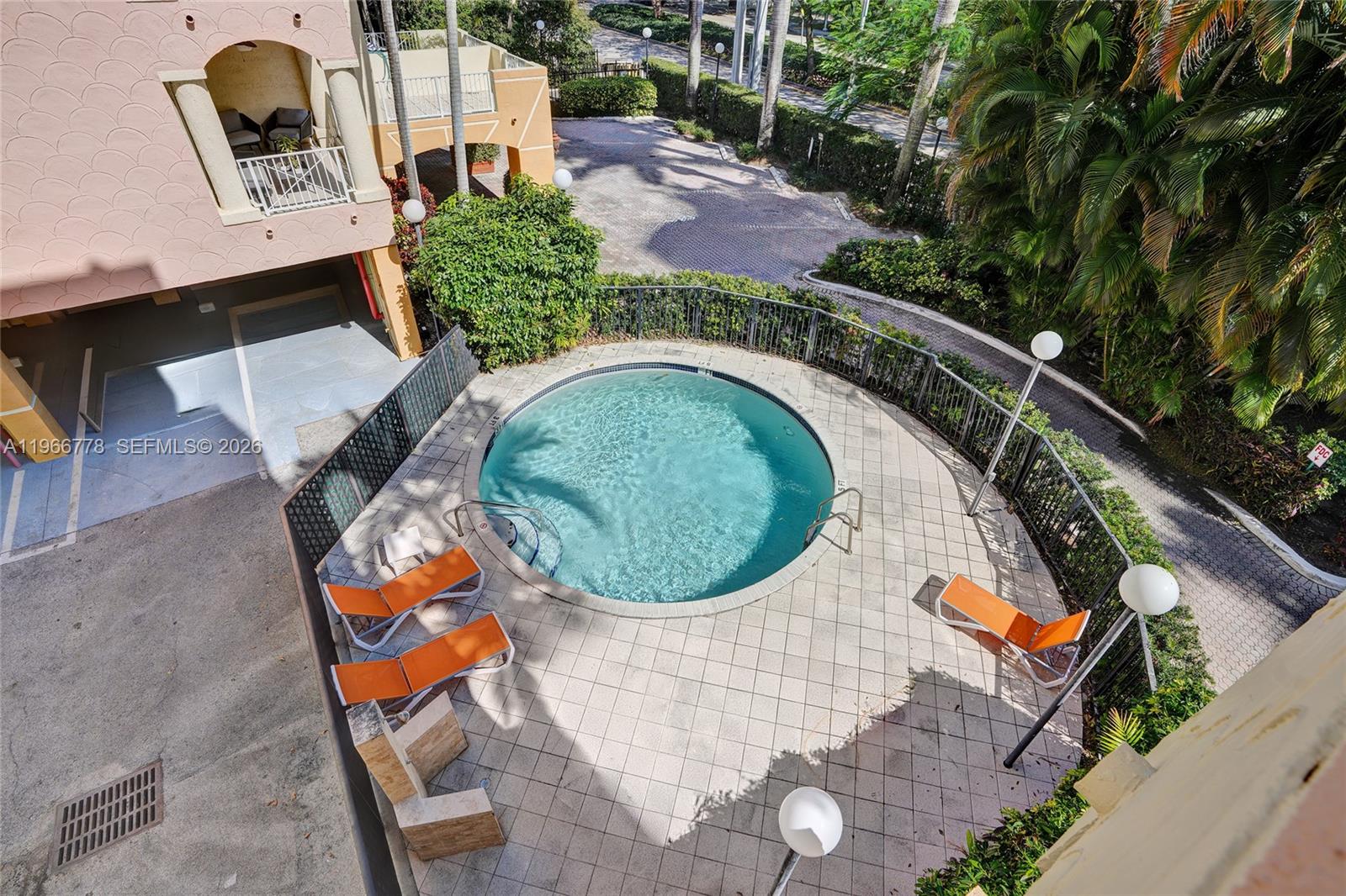 1834 Brickell Avenue, Unit 31 Miami, FL 33129 - Photo 32 of 35 an aerial view of a house with swimming pool and outdoor space