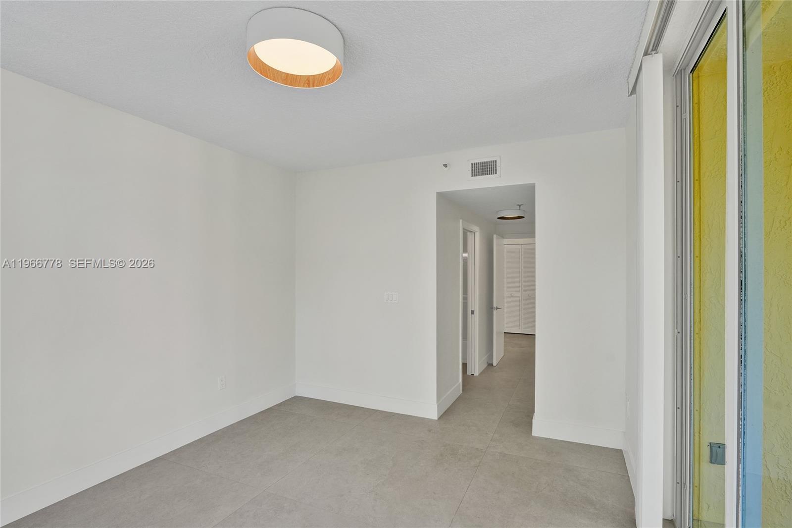 1834 Brickell Avenue, Unit 31 Miami, FL 33129 - Photo 10 of 35 a view of a room with window