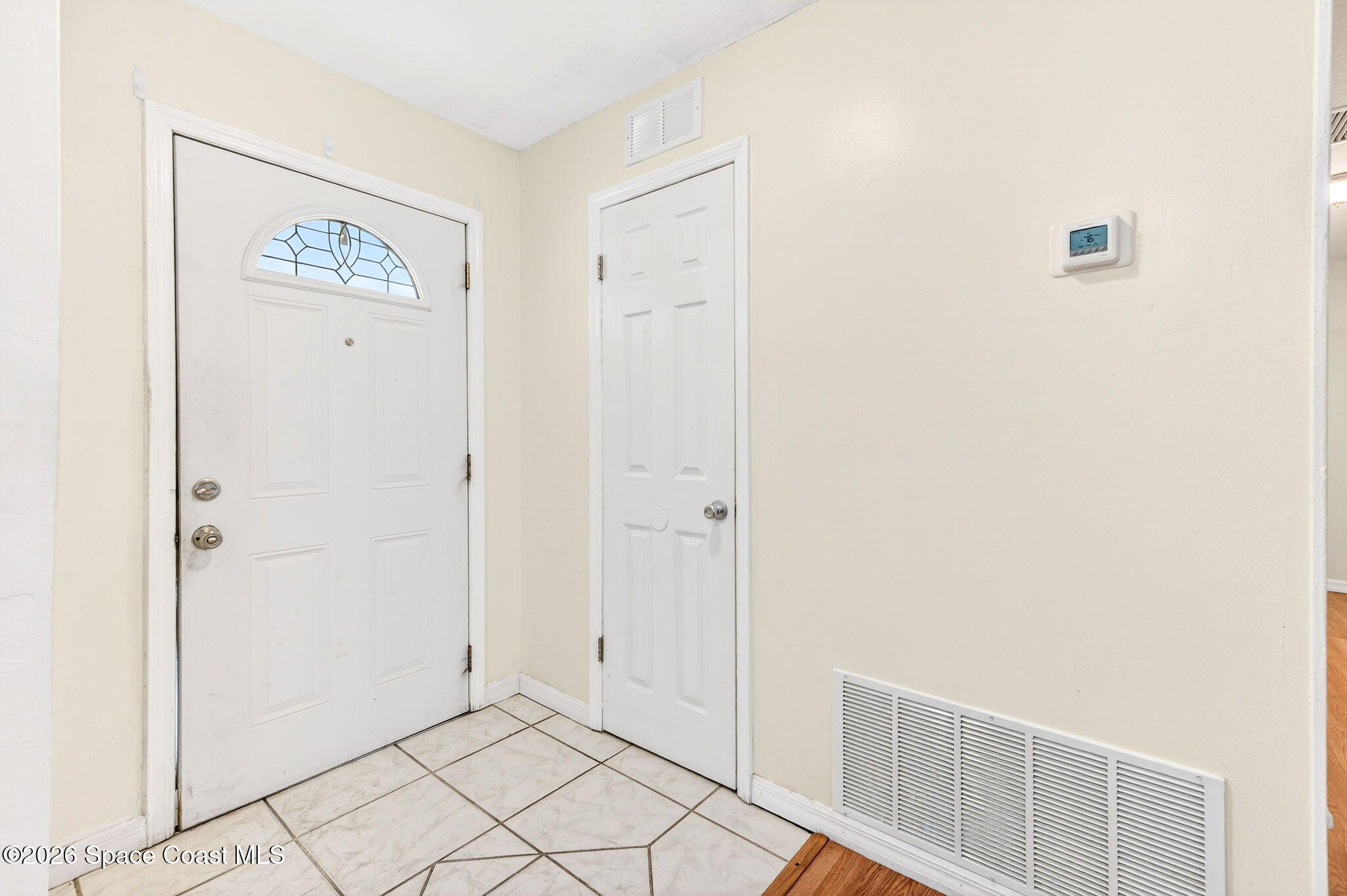 2737 Cherbourg Road Cocoa, FL 32926 - Photo 11 of 44 Come on in! That's a Coat Closet