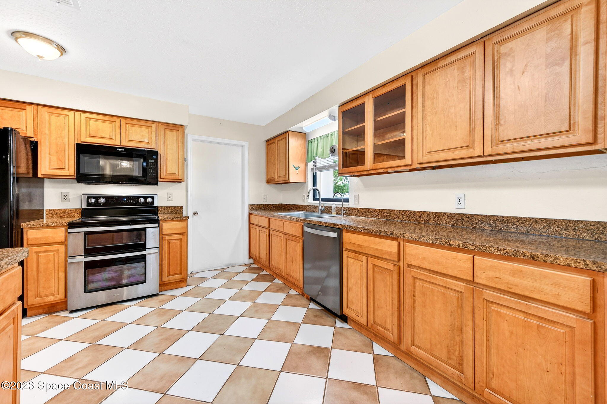 2737 Cherbourg Road Cocoa, FL 32926 - Photo 12 of 44 Lots of Granite Counter Space