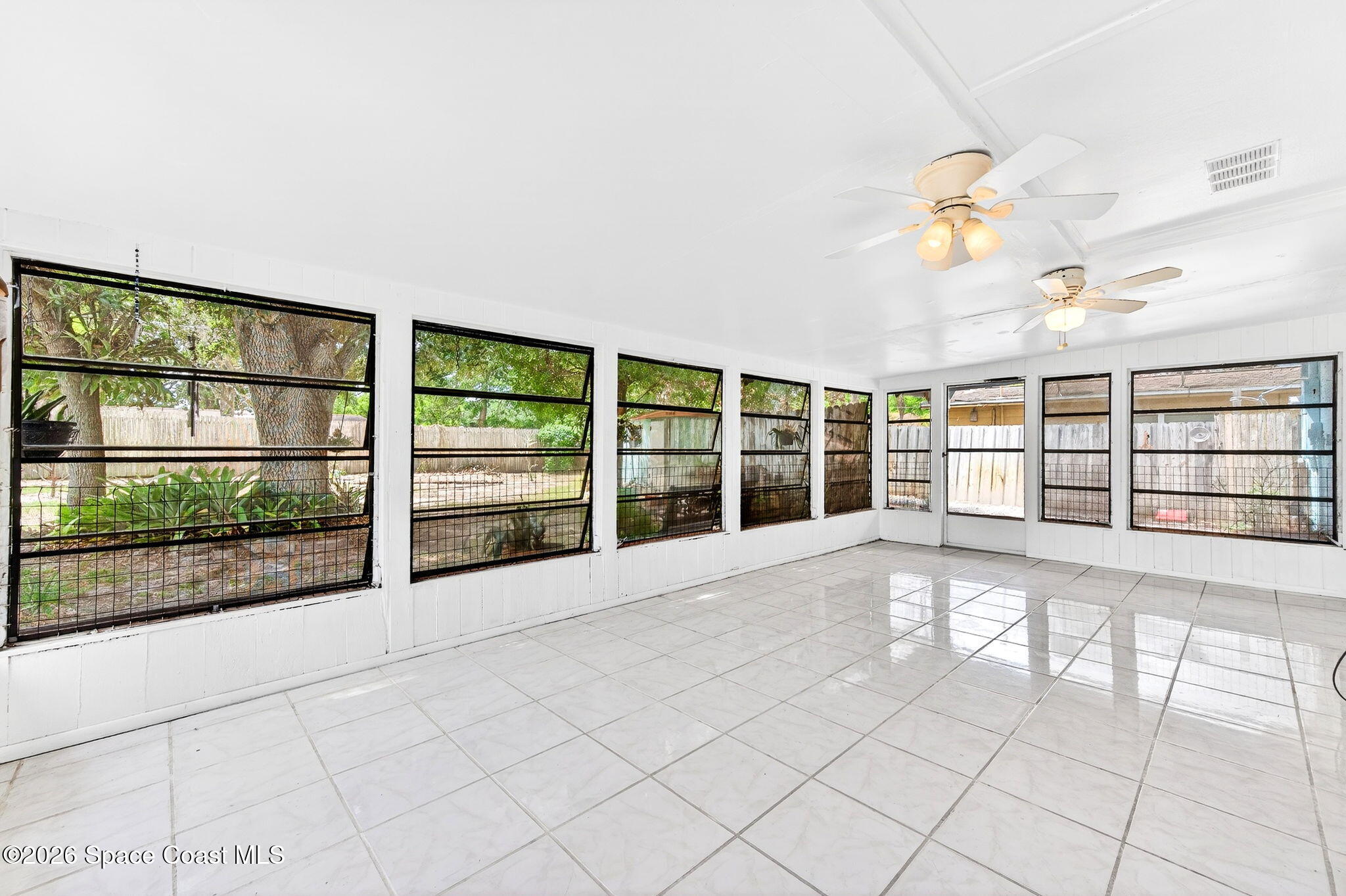 2737 Cherbourg Road Cocoa, FL 32926 - Photo 2 of 44 Look at that HUGE Florida Room!