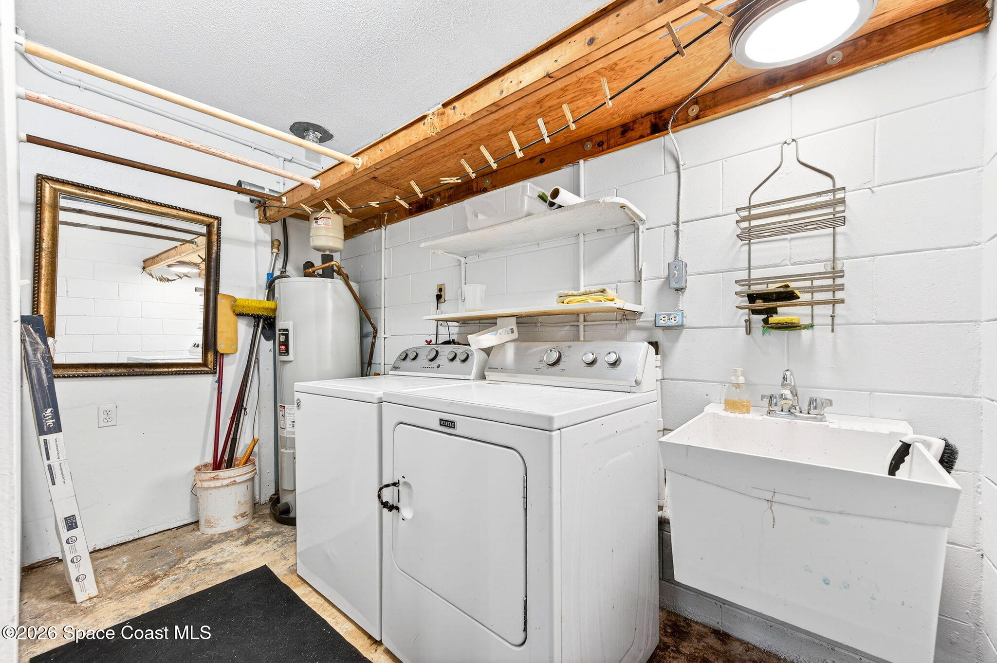 2737 Cherbourg Road Cocoa, FL 32926 - Photo 29 of 44 INSIDE Laundry and Wash Tub