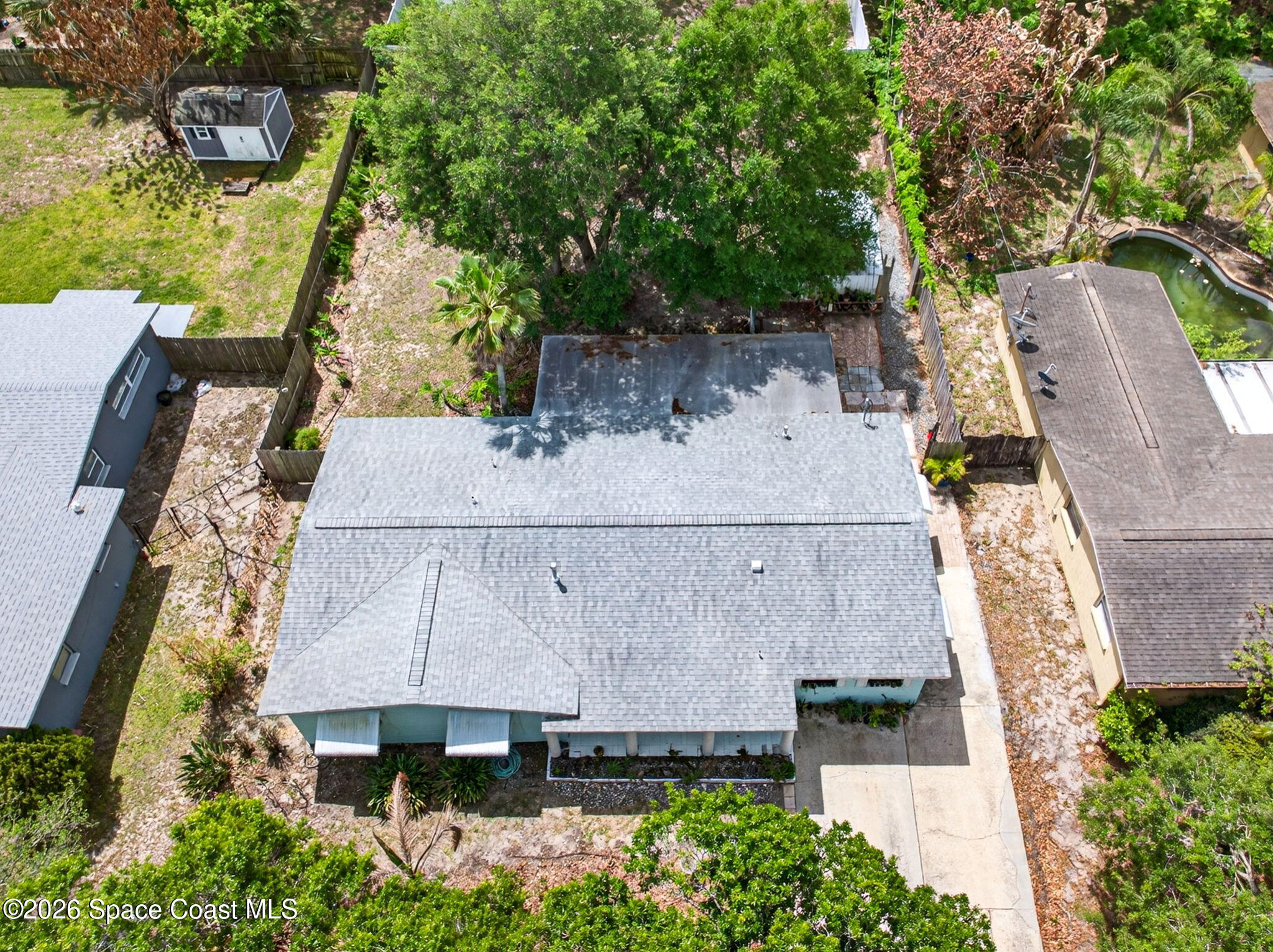2737 Cherbourg Road Cocoa, FL 32926 - Photo 32 of 44 Retractable Shutters on Windows