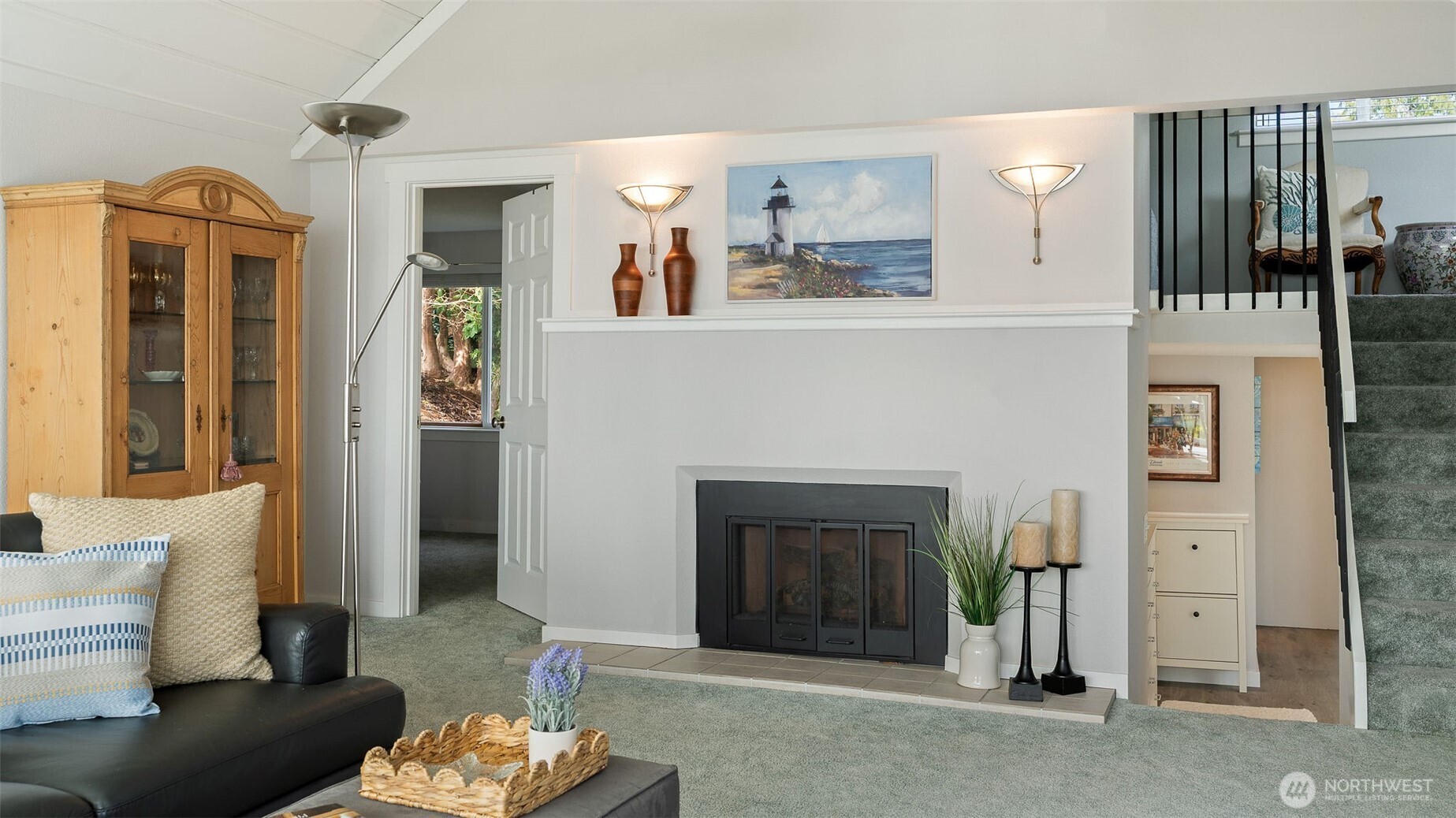 1406 Potlatch Beach Road Marysville, WA 98271 - Photo 11 of 40 a living room with furniture and a fireplace