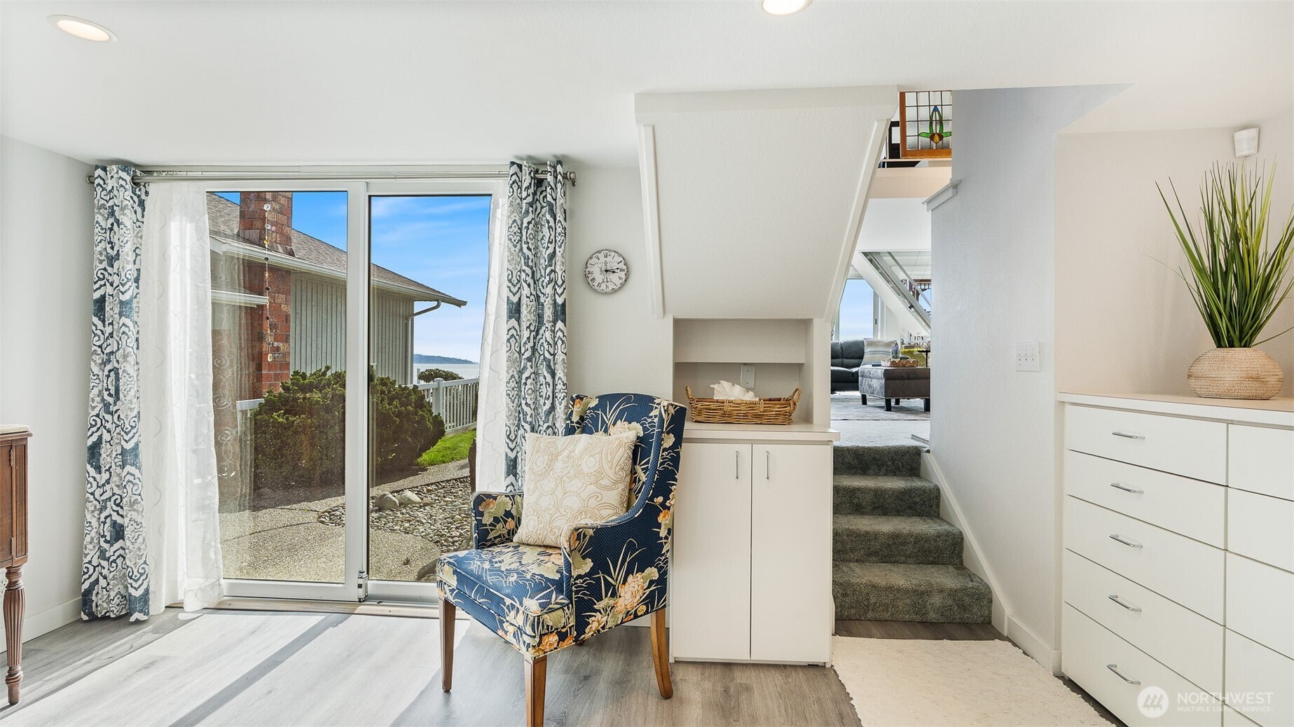 1406 Potlatch Beach Road Marysville, WA 98271 - Photo 15 of 40 a living room with furniture and a wooden floor