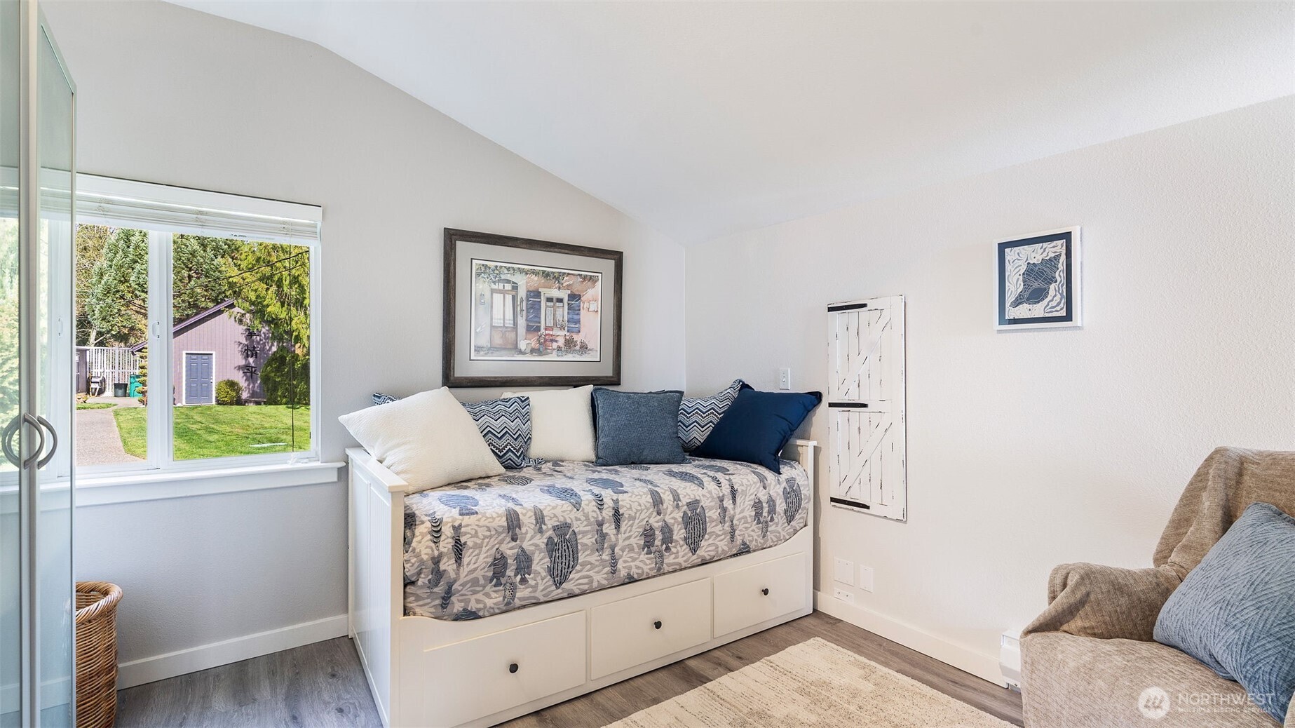 1406 Potlatch Beach Road Marysville, WA 98271 - Photo 18 of 40 a living room with furniture and a large window
