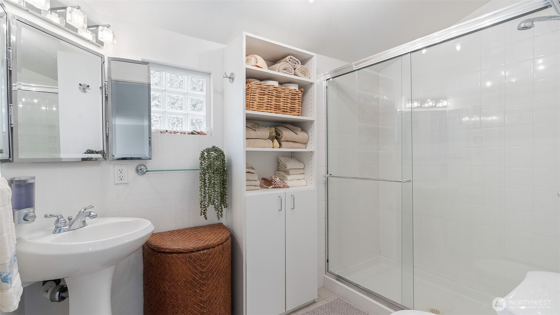 1406 Potlatch Beach Road Marysville, WA 98271 - Photo 20 of 40 a bathroom with a sink a toilet and shower