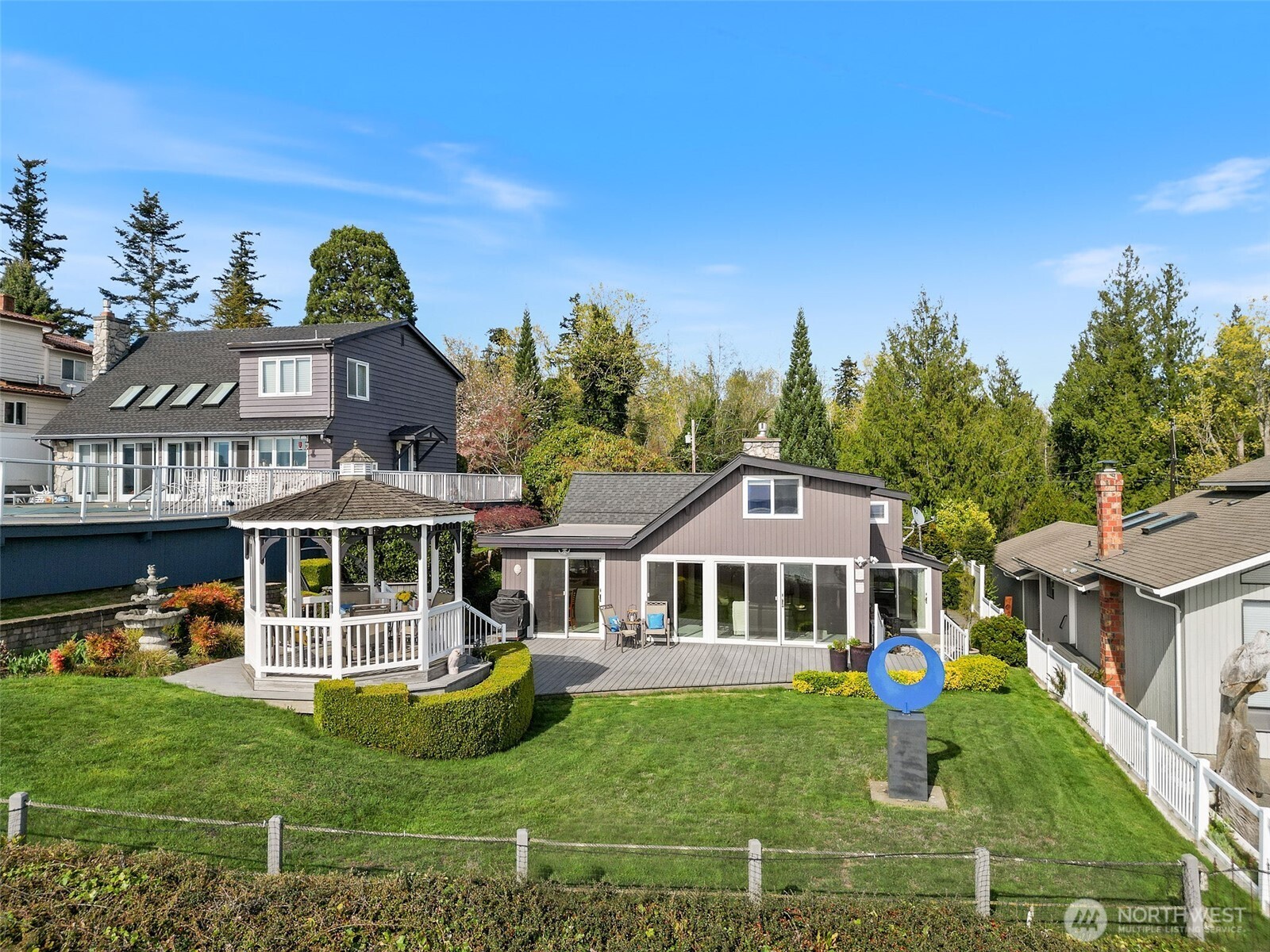 1406 Potlatch Beach Road Marysville, WA 98271 - Photo 2 of 40 a front view of a house with a garden