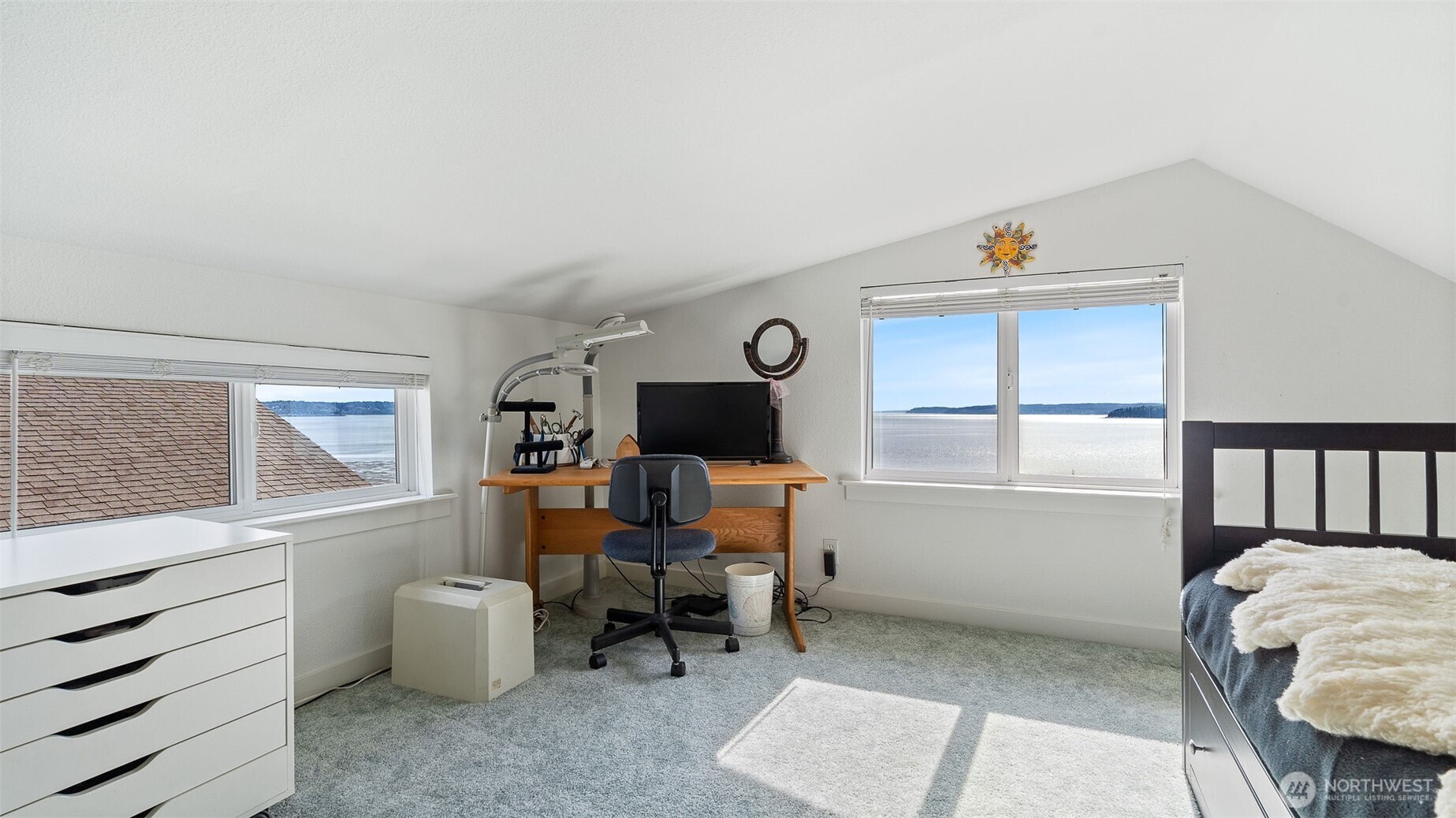 1406 Potlatch Beach Road Marysville, WA 98271 - Photo 25 of 40 a living room with furniture and a window