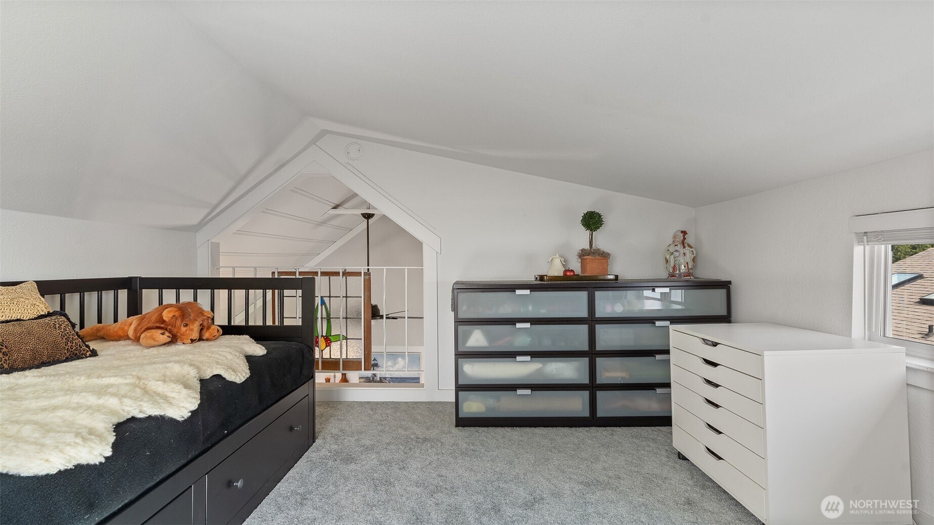 1406 Potlatch Beach Road Marysville, WA 98271 - Photo 26 of 40 a bedroom with furniture and white walls