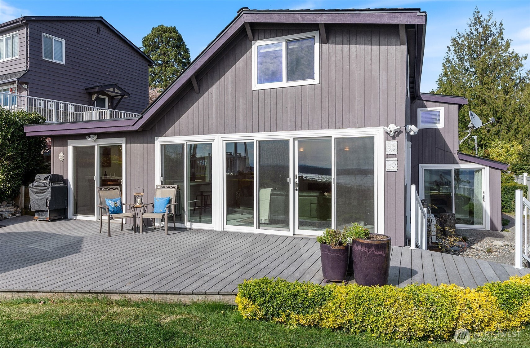 1406 Potlatch Beach Road Marysville, WA 98271 - Photo 31 of 40 a front view of a house with a yard outdoor seating and barbeque oven