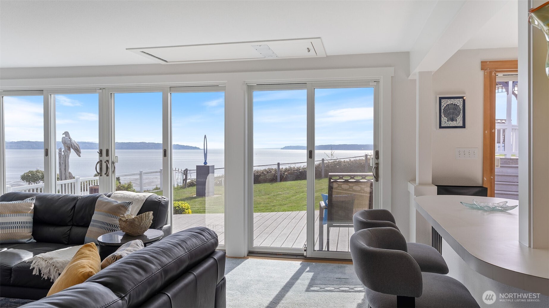 1406 Potlatch Beach Road Marysville, WA 98271 - Photo 5 of 40 a living room with furniture and a large window