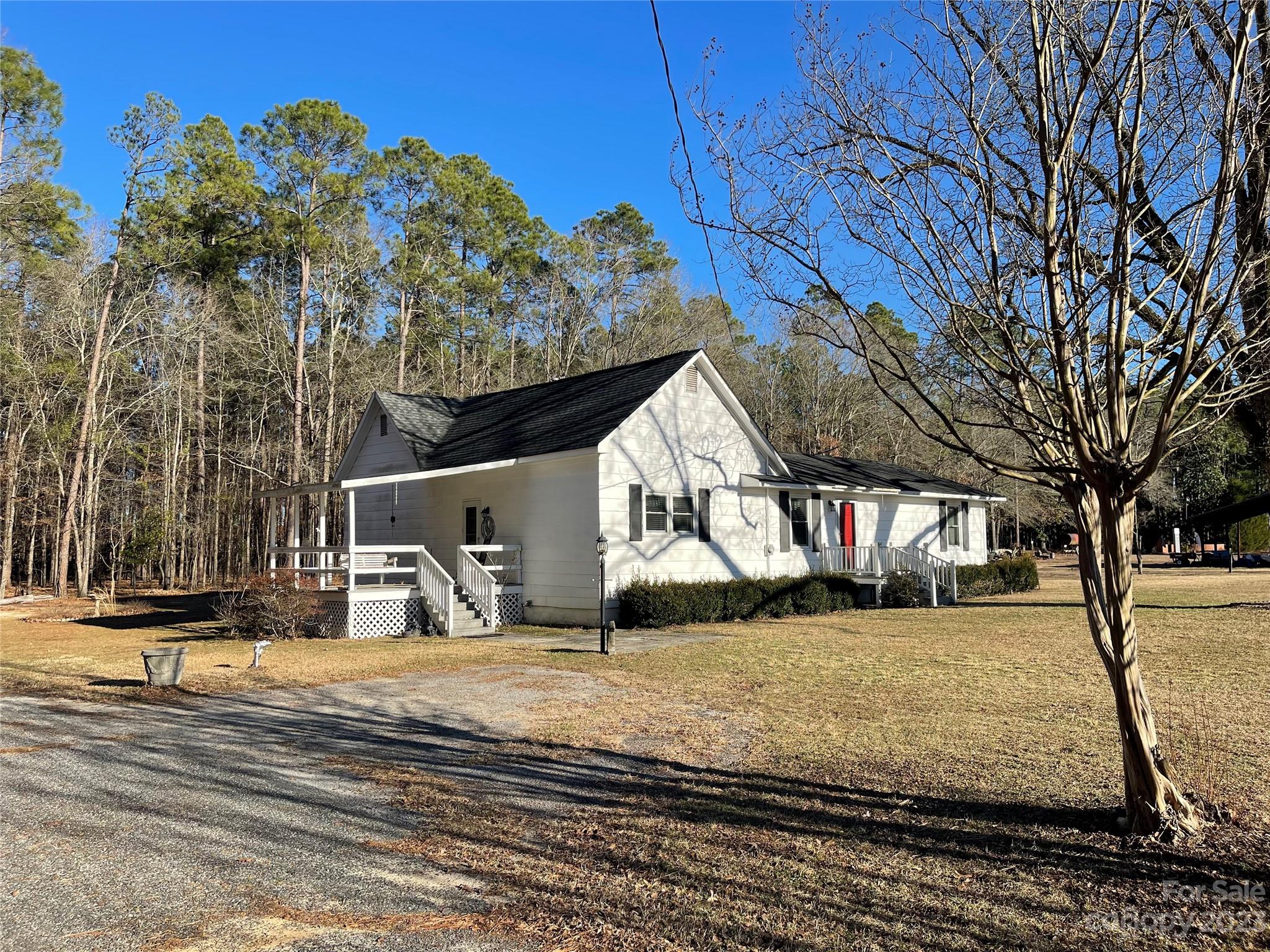 406 Fair Street Bethune, SC 29009 - Photo 1 of 28 a view of a house with snow