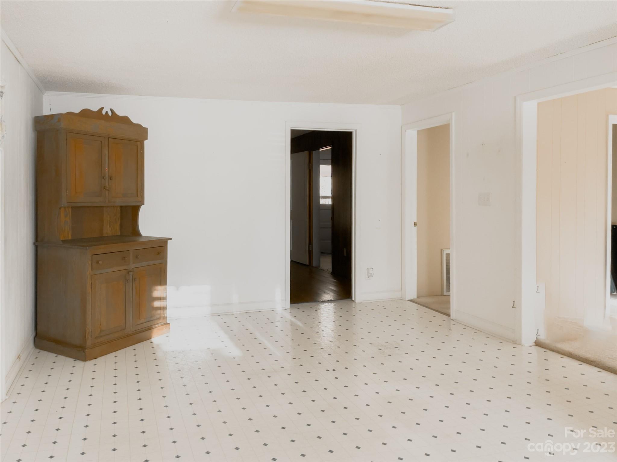 406 Fair Street Bethune, SC 29009 - Photo 15 of 28 a view of an empty room with wooden floor