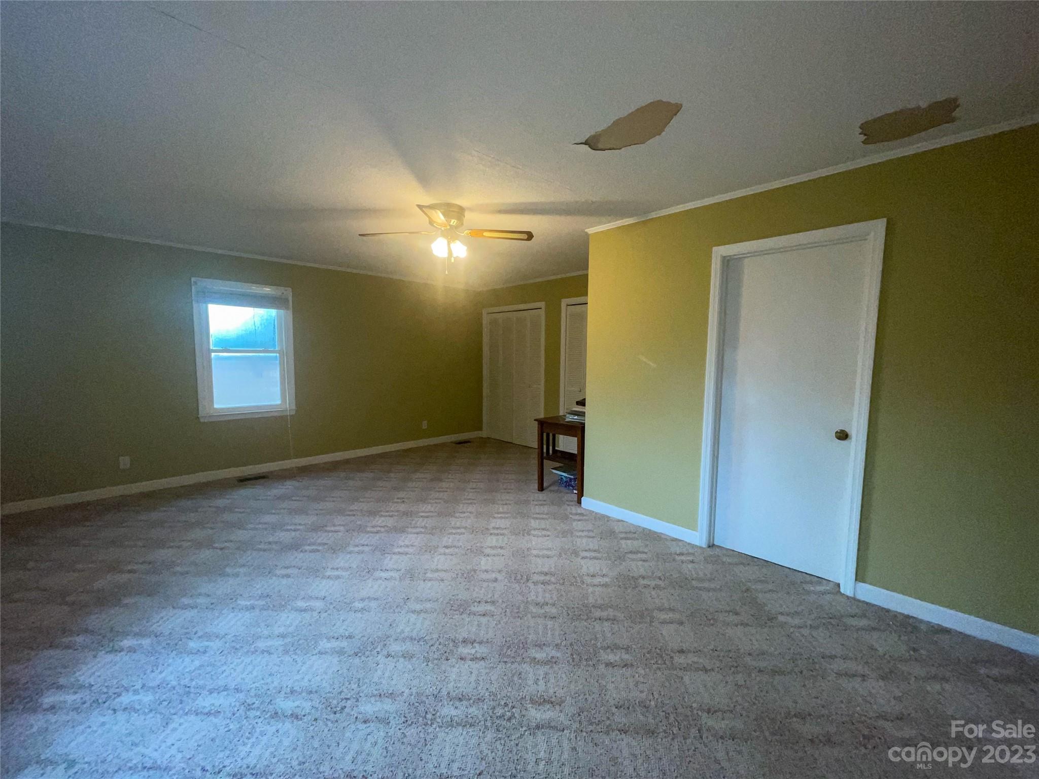 406 Fair Street Bethune, SC 29009 - Photo 17 of 28 a view of an empty room and window