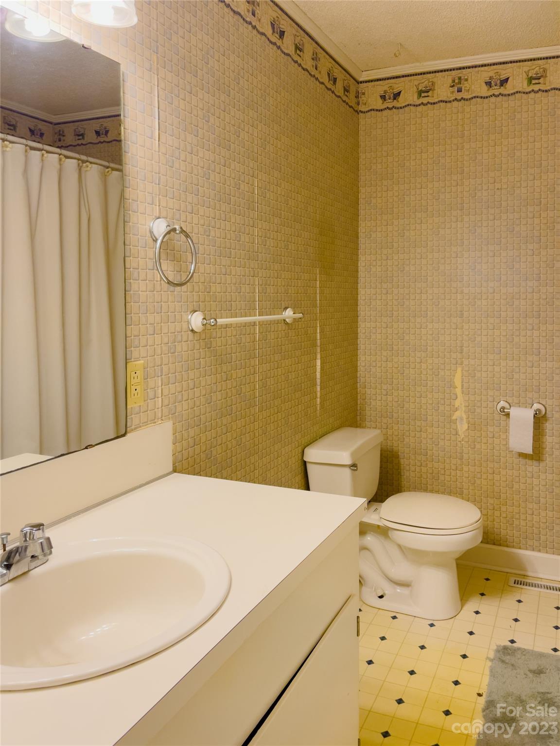 406 Fair Street Bethune, SC 29009 - Photo 26 of 28 a bathroom with a sink toilet and shower