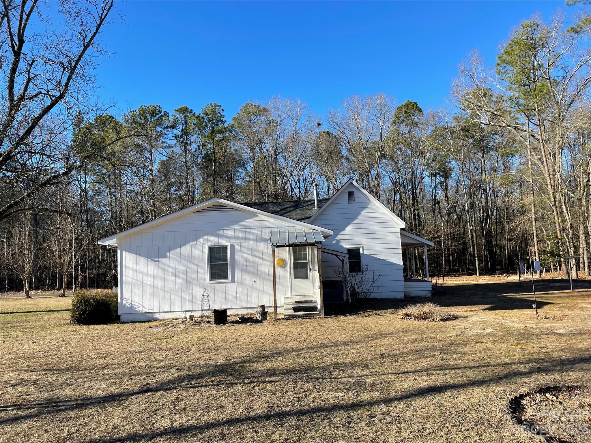 406 Fair Street Bethune, SC 29009 - Photo 4 of 28 a front view of a house with a yard