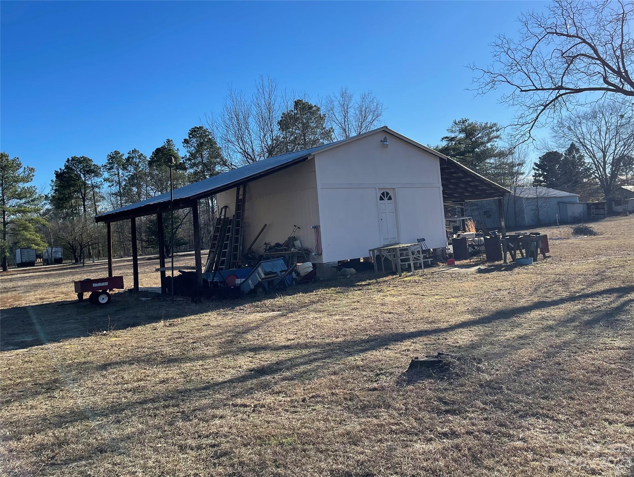 406 Fair Street Bethune, SC 29009 - Photo 6 of 28 a view of a house with a patio