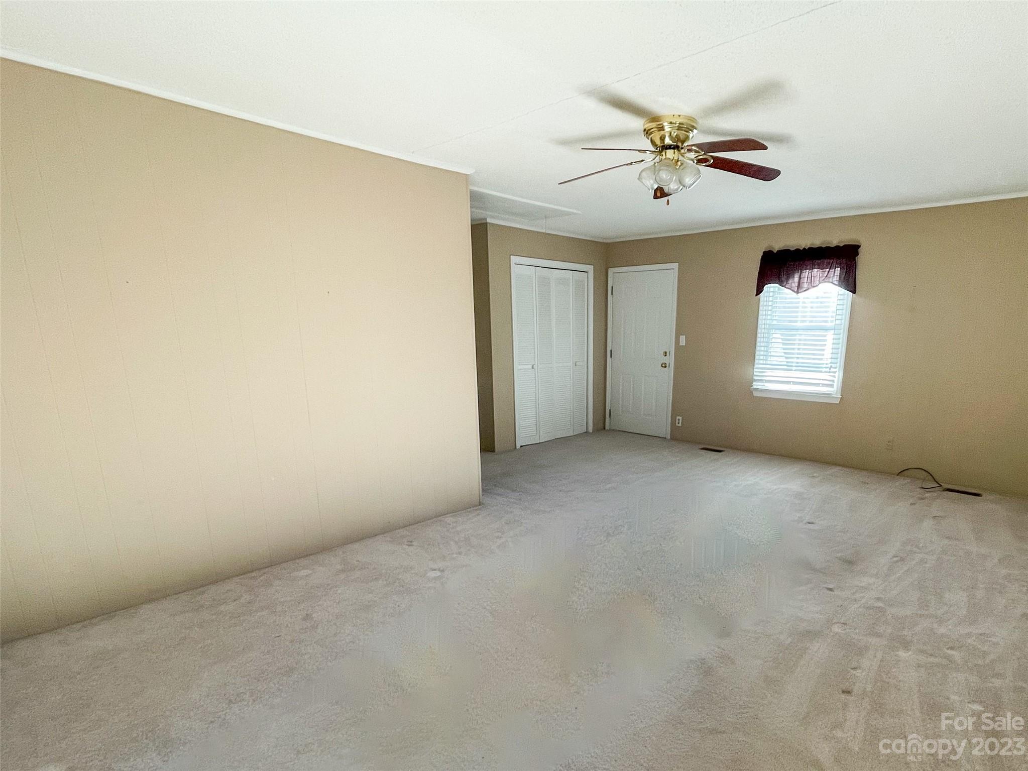 406 Fair Street Bethune, SC 29009 - Photo 7 of 28 a view of an empty room with a window