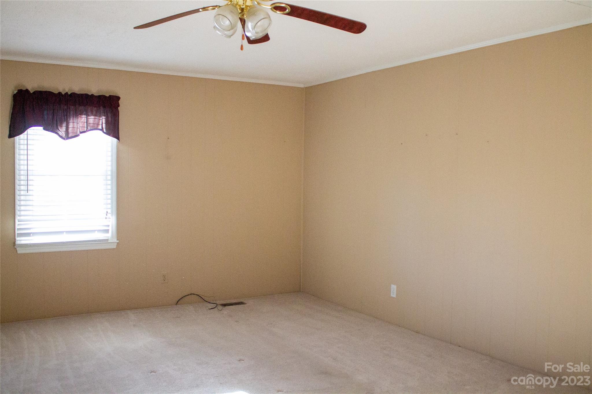 406 Fair Street Bethune, SC 29009 - Photo 10 of 28 an empty room with a window