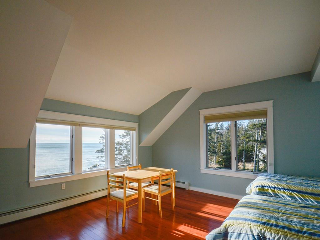 382 Red Point Road Swans Island, ME 04685 - Photo 23 of 35 Large Bedroom on second floor.