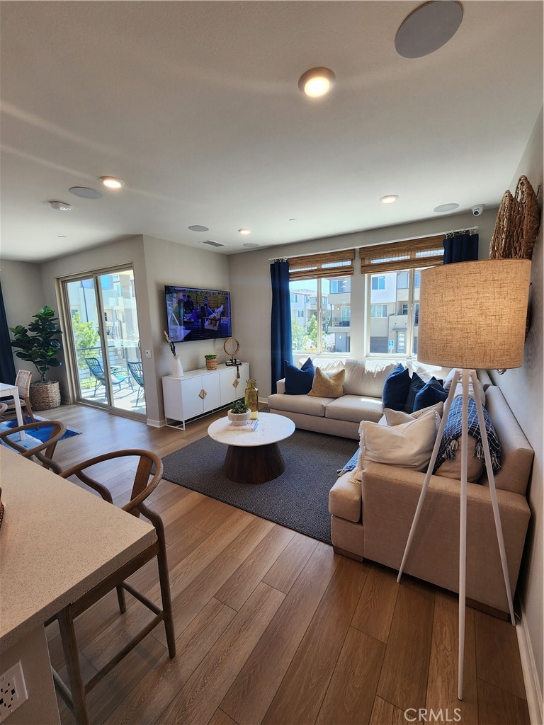 1553 Lima Way, Unit 5 Placentia, CA 92870 - Photo 15 of 22 a living room with furniture and a large window