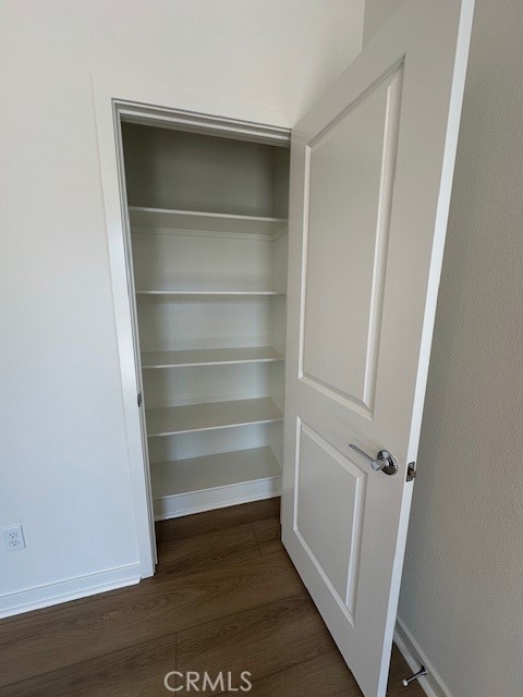 1553 Lima Way, Unit 5 Placentia, CA 92870 - Photo 18 of 22 a view of walk in closet with empty racks