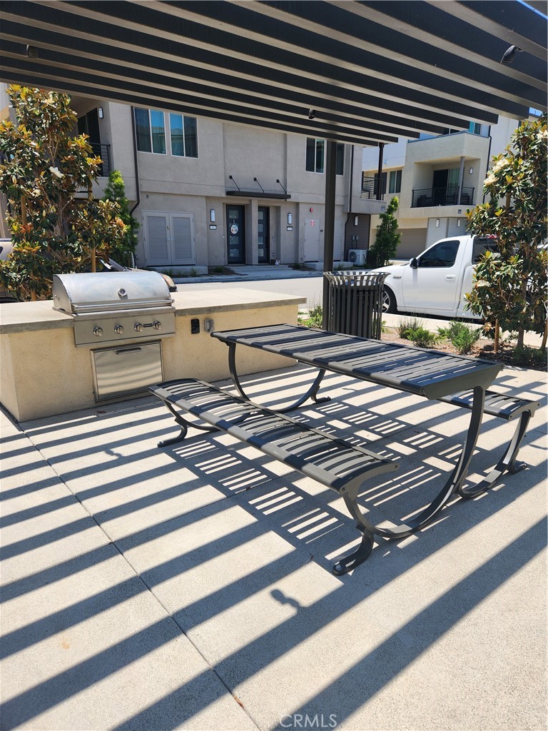 1553 Lima Way, Unit 5 Placentia, CA 92870 - Photo 7 of 22 a view of a chair and tables in the balcony