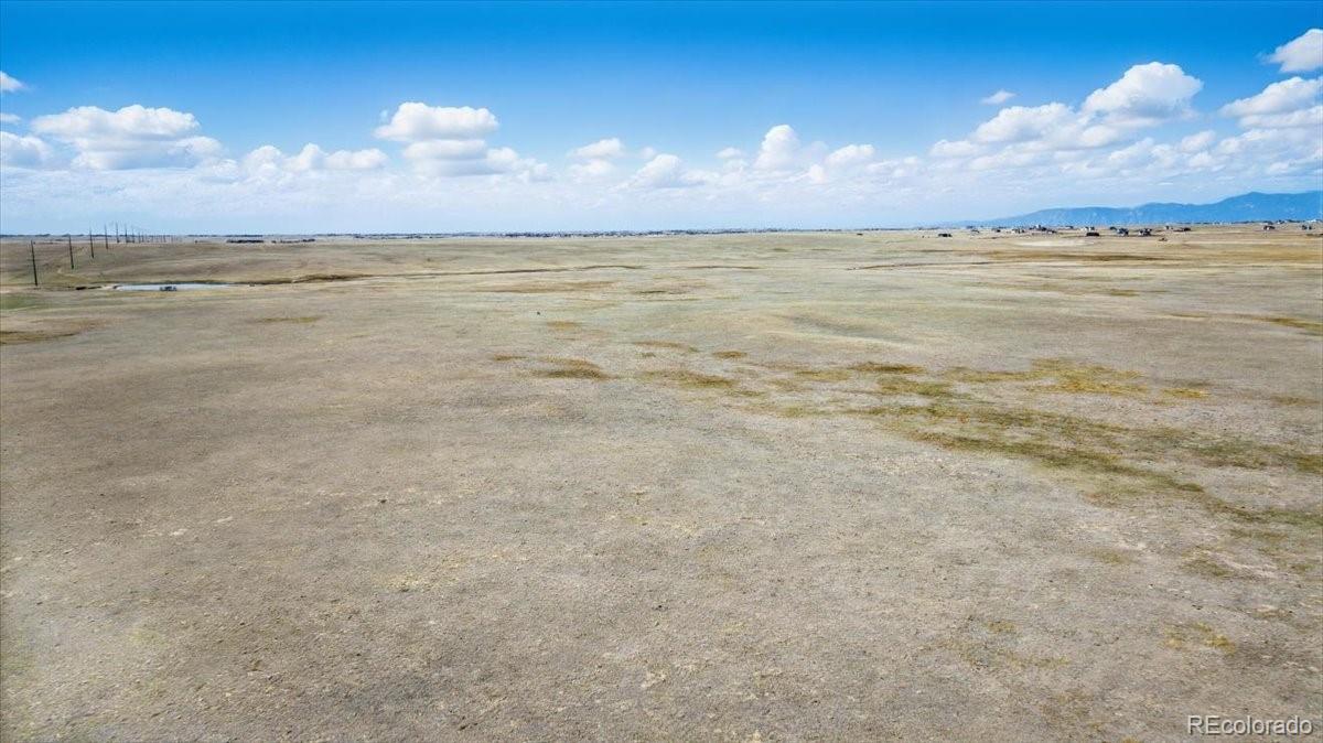 0 Judge Orr Road Peyton, CO 80831 - Photo 13 of 17 a view of an ocean and beach
