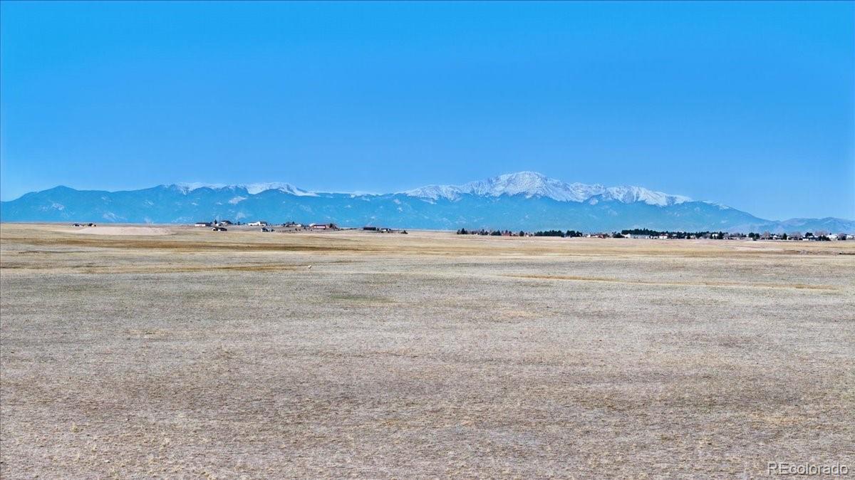 0 Judge Orr Road Peyton, CO 80831 - Photo 2 of 17 a view of an ocean and a mountain