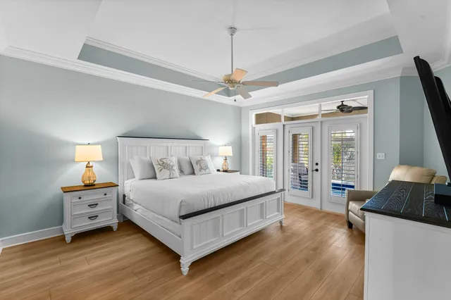 a bedroom with bed and window