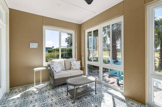 a living room with furniture and a window