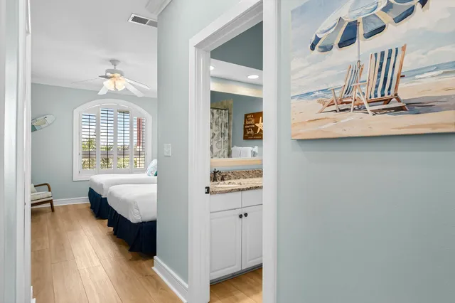 a en suite bathroom with a sink and a mirror