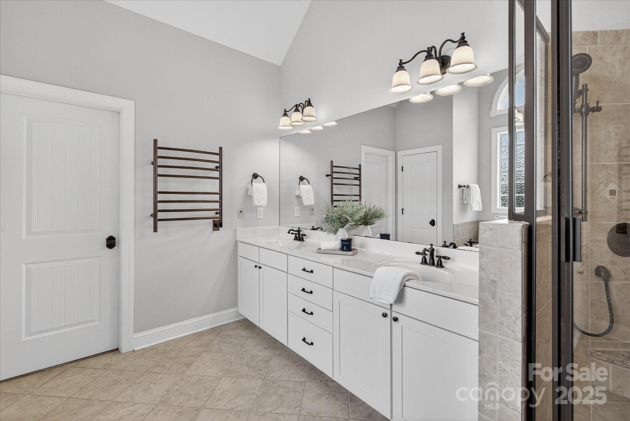 1912 Windmere Drive Monroe, NC 28110 - Photo 19 of 37 a bathroom with a double vanity sink mirror and shower